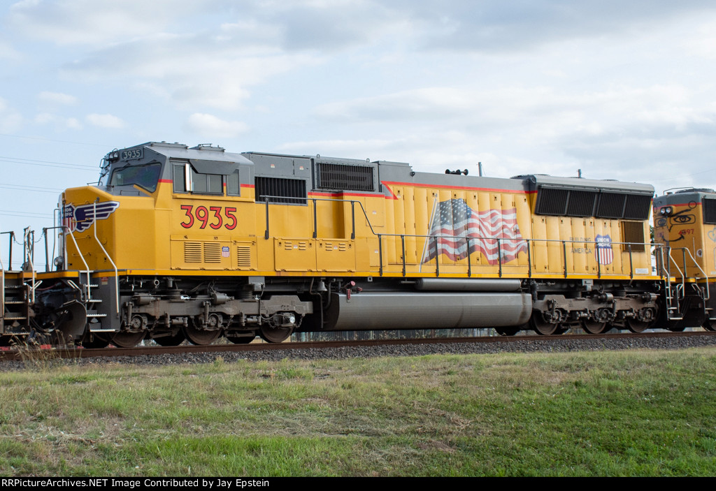 UP 3935 trails on an eastbound manifest